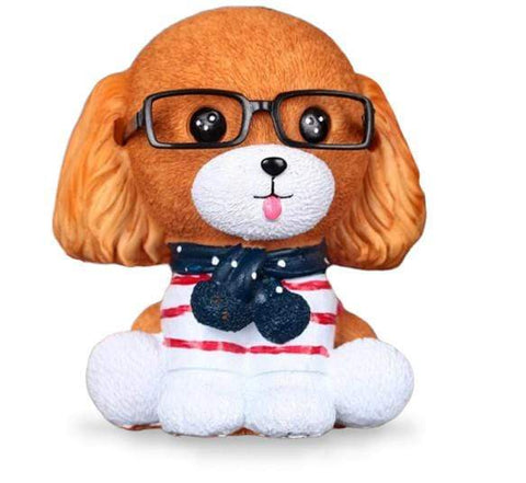 tirelire petit chien brun marron clair avec des petites lunettes et une écharpe