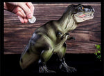 Tirelire dinosaure en forme de tyrannosarus rex T-rex